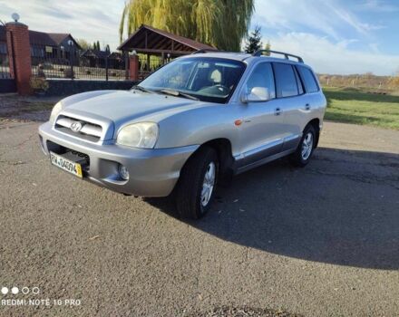 Серый Хендай Санта Фе, объемом двигателя 2 л и пробегом 237 тыс. км за 4200 $, фото 1 на Automoto.ua