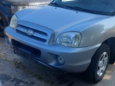 Серый Хендай Санта Фе, объемом двигателя 2.5 л и пробегом 195 тыс. км за 2942 $, фото 1 на Automoto.ua