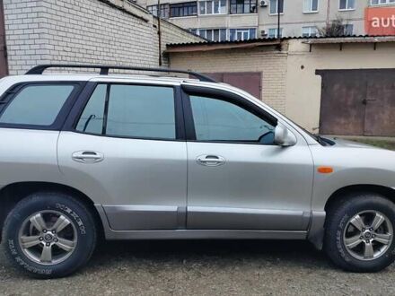 Сірий Хендай Санта Фе, об'ємом двигуна 2.35 л та пробігом 230 тис. км за 6500 $, фото 1 на Automoto.ua