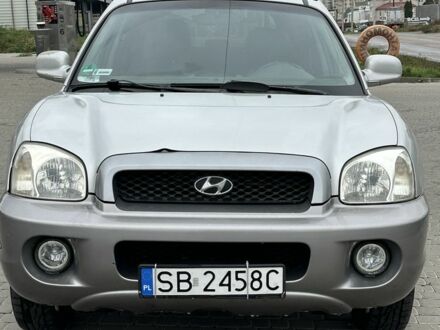 Серый Хендай Санта Фе, объемом двигателя 2 л и пробегом 235 тыс. км за 4000 $, фото 1 на Automoto.ua