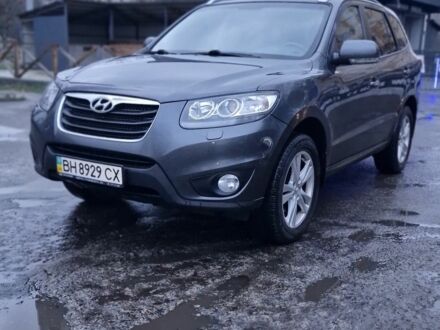 Серый Хендай Санта Фе, объемом двигателя 2.4 л и пробегом 194 тыс. км за 11500 $, фото 1 на Automoto.ua