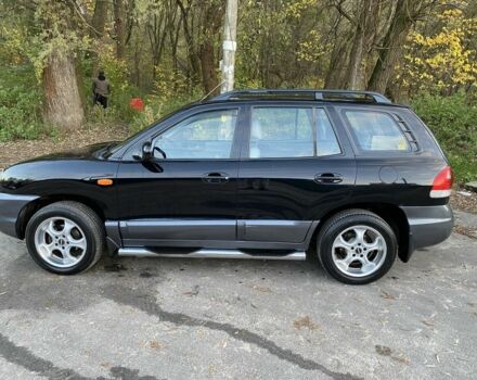 Синий Хендай Санта Фе, объемом двигателя 2.4 л и пробегом 145 тыс. км за 3900 $, фото 3 на Automoto.ua