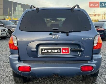 Синий Хендай Санта Фе, объемом двигателя 2 л и пробегом 232 тыс. км за 6890 $, фото 7 на Automoto.ua