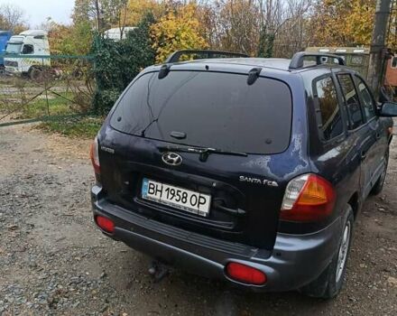 Синий Хендай Санта Фе, объемом двигателя 2.35 л и пробегом 346 тыс. км за 4700 $, фото 5 на Automoto.ua