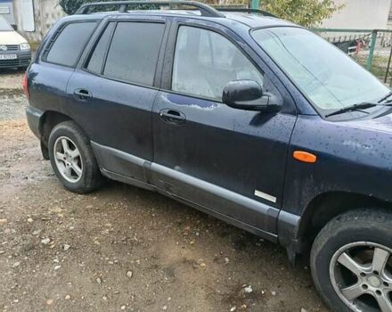 Синий Хендай Санта Фе, объемом двигателя 2.35 л и пробегом 346 тыс. км за 4700 $, фото 3 на Automoto.ua