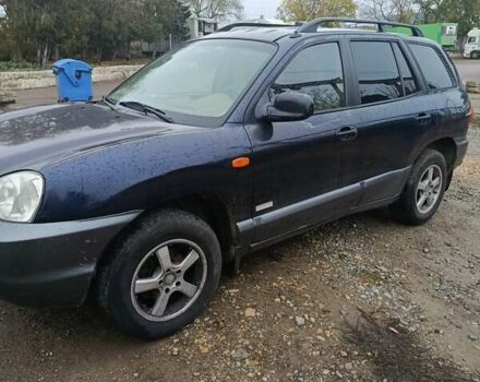 Синий Хендай Санта Фе, объемом двигателя 2.35 л и пробегом 346 тыс. км за 4700 $, фото 4 на Automoto.ua