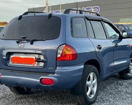 Синий Хендай Санта Фе, объемом двигателя 2 л и пробегом 232 тыс. км за 7000 $, фото 3 на Automoto.ua
