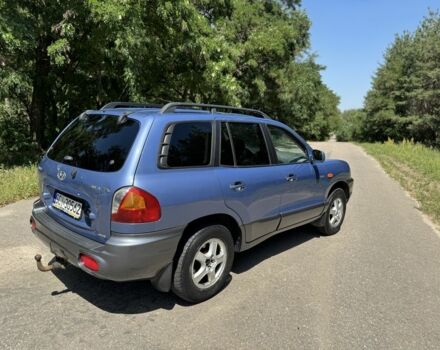 Синий Хендай Санта Фе, объемом двигателя 2 л и пробегом 225 тыс. км за 4800 $, фото 5 на Automoto.ua
