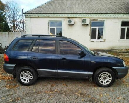 Синий Хендай Санта Фе, объемом двигателя 2 л и пробегом 223 тыс. км за 3114 $, фото 2 на Automoto.ua