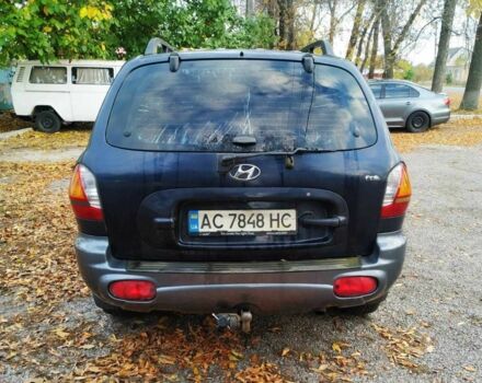 Синий Хендай Санта Фе, объемом двигателя 2 л и пробегом 223 тыс. км за 3114 $, фото 4 на Automoto.ua