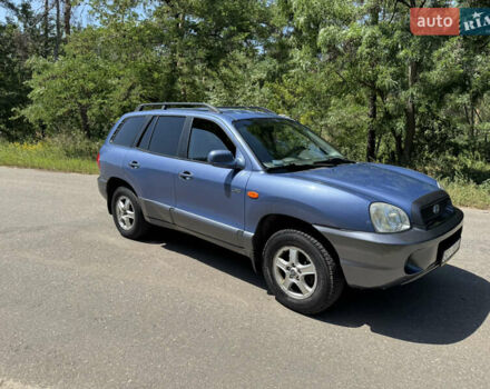 Синий Хендай Санта Фе, объемом двигателя 2 л и пробегом 225 тыс. км за 4800 $, фото 3 на Automoto.ua