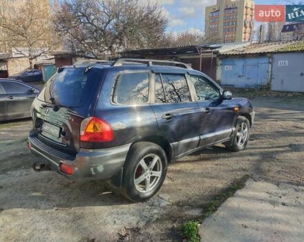 Синий Хендай Санта Фе, объемом двигателя 2.4 л и пробегом 293 тыс. км за 3500 $, фото 5 на Automoto.ua
