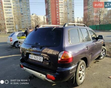 Синий Хендай Санта Фе, объемом двигателя 2.02 л и пробегом 330 тыс. км за 5000 $, фото 11 на Automoto.ua