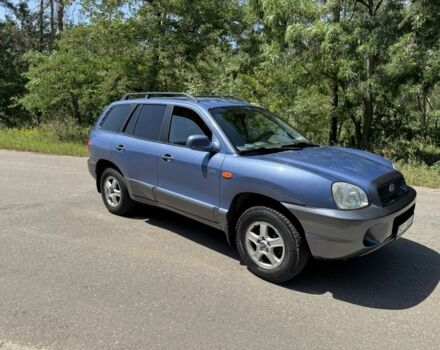 Синий Хендай Санта Фе, объемом двигателя 2 л и пробегом 225 тыс. км за 4800 $, фото 3 на Automoto.ua