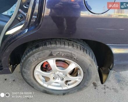 Синий Хендай Санта Фе, объемом двигателя 2.02 л и пробегом 330 тыс. км за 5000 $, фото 4 на Automoto.ua