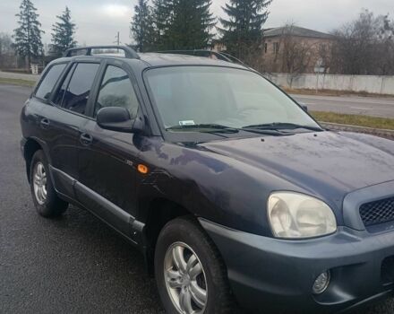 Синий Хендай Санта Фе, объемом двигателя 2 л и пробегом 262 тыс. км за 2300 $, фото 7 на Automoto.ua