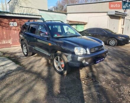 Синий Хендай Санта Фе, объемом двигателя 2.4 л и пробегом 293 тыс. км за 3500 $, фото 1 на Automoto.ua