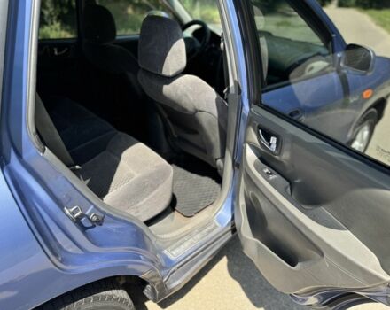 Синий Хендай Санта Фе, объемом двигателя 2 л и пробегом 225 тыс. км за 4800 $, фото 9 на Automoto.ua