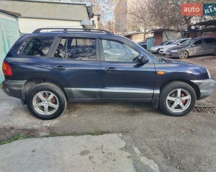 Синий Хендай Санта Фе, объемом двигателя 2.4 л и пробегом 293 тыс. км за 3500 $, фото 2 на Automoto.ua