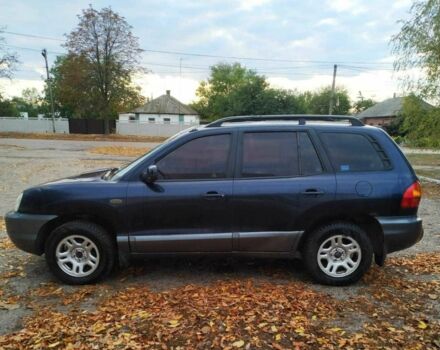 Синий Хендай Санта Фе, объемом двигателя 2 л и пробегом 223 тыс. км за 3114 $, фото 3 на Automoto.ua