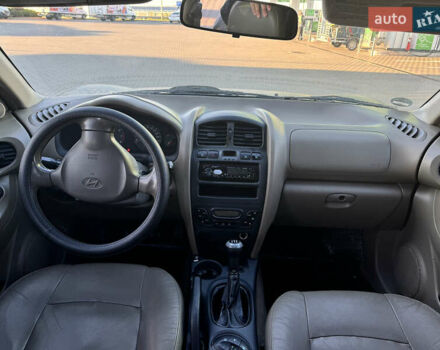 Синий Хендай Санта Фе, объемом двигателя 2.35 л и пробегом 240 тыс. км за 5300 $, фото 5 на Automoto.ua