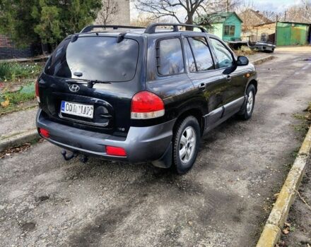 Синий Хендай Санта Фе, объемом двигателя 1.9 л и пробегом 250 тыс. км за 4000 $, фото 3 на Automoto.ua