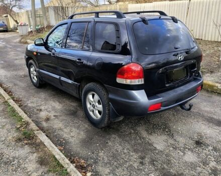 Синий Хендай Санта Фе, объемом двигателя 1.9 л и пробегом 250 тыс. км за 4000 $, фото 2 на Automoto.ua