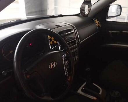 Синий Хендай Санта Фе, объемом двигателя 2.19 л и пробегом 294 тыс. км за 6000 $, фото 6 на Automoto.ua