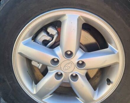 Синий Хендай Санта Фе, объемом двигателя 2.19 л и пробегом 245 тыс. км за 9400 $, фото 2 на Automoto.ua