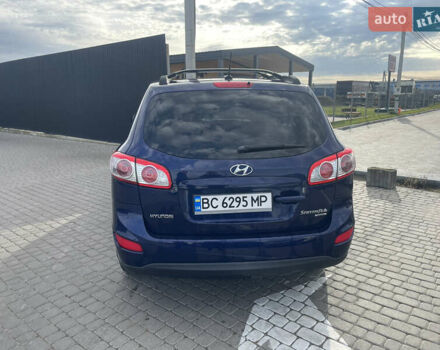 Синий Хендай Санта Фе, объемом двигателя 2.36 л и пробегом 300 тыс. км за 8750 $, фото 2 на Automoto.ua