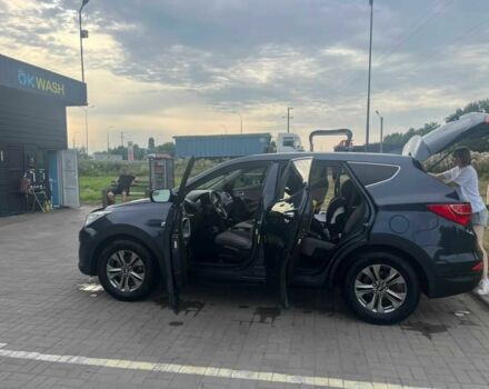 Синий Хендай Санта Фе, объемом двигателя 2.4 л и пробегом 185 тыс. км за 10700 $, фото 3 на Automoto.ua