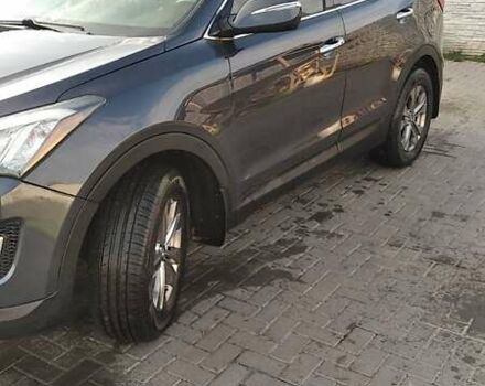 Синий Хендай Санта Фе, объемом двигателя 2.4 л и пробегом 167 тыс. км за 14900 $, фото 1 на Automoto.ua