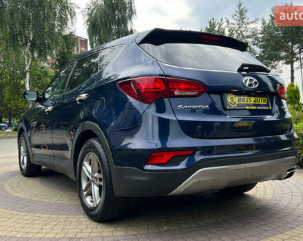 Синий Хендай Санта Фе, объемом двигателя 2.4 л и пробегом 190 тыс. км за 16300 $, фото 4 на Automoto.ua