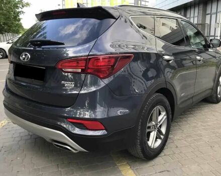 Синий Хендай Санта Фе, объемом двигателя 2.4 л и пробегом 70 тыс. км за 13300 $, фото 4 на Automoto.ua