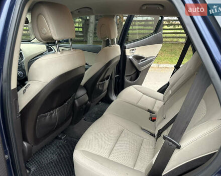 Синий Хендай Санта Фе, объемом двигателя 2.4 л и пробегом 86 тыс. км за 15500 $, фото 12 на Automoto.ua