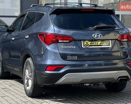 Синий Хендай Санта Фе, объемом двигателя 2.36 л и пробегом 115 тыс. км за 16100 $, фото 3 на Automoto.ua