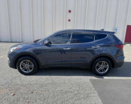 Синий Хендай Санта Фе, объемом двигателя 2.4 л и пробегом 61 тыс. км за 9100 $, фото 2 на Automoto.ua