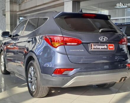 Синий Хендай Санта Фе, объемом двигателя 2 л и пробегом 140 тыс. км за 20940 $, фото 4 на Automoto.ua