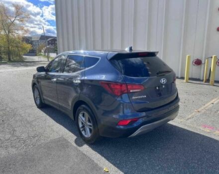 Синий Хендай Санта Фе, объемом двигателя 2.4 л и пробегом 61 тыс. км за 9100 $, фото 6 на Automoto.ua