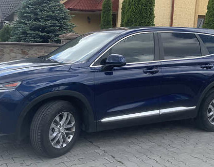 Синий Хендай Санта Фе, объемом двигателя 2.4 л и пробегом 62 тыс. км за 19999 $, фото 1 на Automoto.ua