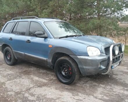 Синий Хендай Санта Фе, объемом двигателя 2.7 л и пробегом 300 тыс. км за 2350 $, фото 1 на Automoto.ua