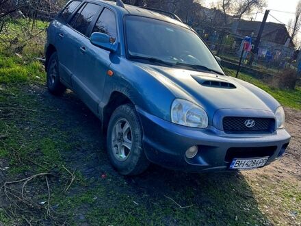 Синий Хендай Санта Фе, объемом двигателя 2 л и пробегом 300 тыс. км за 4200 $, фото 1 на Automoto.ua