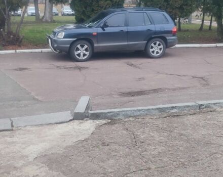 Синий Хендай Санта Фе, объемом двигателя 2 л и пробегом 260 тыс. км за 3500 $, фото 1 на Automoto.ua