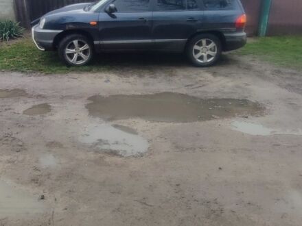 Синий Хендай Санта Фе, объемом двигателя 2 л и пробегом 253 тыс. км за 2952 $, фото 1 на Automoto.ua