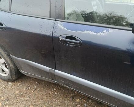 Синий Хендай Санта Фе, объемом двигателя 2.35 л и пробегом 346 тыс. км за 4700 $, фото 1 на Automoto.ua