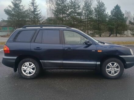 Синий Хендай Санта Фе, объемом двигателя 2 л и пробегом 262 тыс. км за 2300 $, фото 1 на Automoto.ua