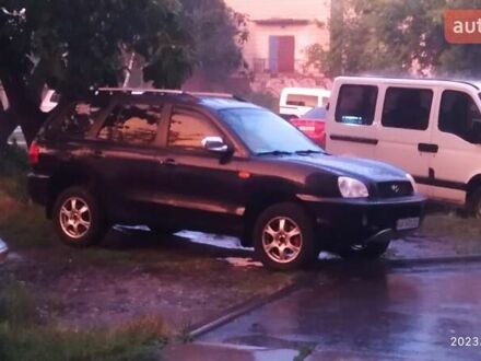 Синий Хендай Санта Фе, объемом двигателя 2.02 л и пробегом 330 тыс. км за 5000 $, фото 1 на Automoto.ua