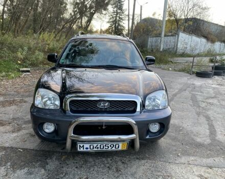 Синий Хендай Санта Фе, объемом двигателя 2.4 л и пробегом 145 тыс. км за 3900 $, фото 1 на Automoto.ua