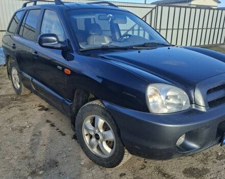 Синий Хендай Санта Фе, объемом двигателя 2 л и пробегом 314 тыс. км за 3700 $, фото 1 на Automoto.ua