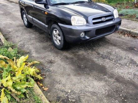 Синий Хендай Санта Фе, объемом двигателя 1.9 л и пробегом 250 тыс. км за 4000 $, фото 1 на Automoto.ua